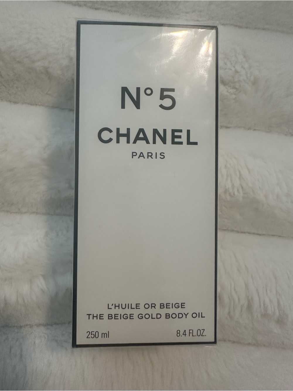 CHANEL Shimmering Fragranced Body Oil — Beige & Gold Accents